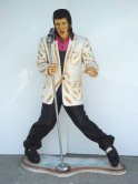 Elvis Presley standing singing into Microphone Elvis Presley standing singing into Microphone