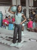 Bronze Girl Playing Soccer Bronze Girl Playing Soccer