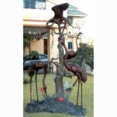 Four Bronze Cranes by a Tree Four Bronze Cranes by a Tree