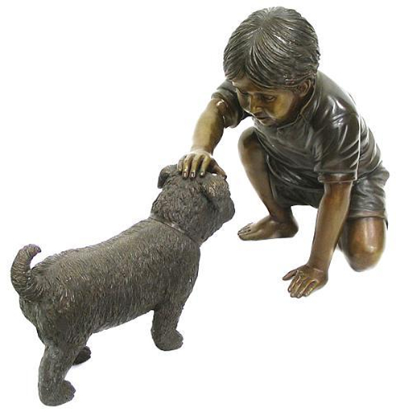 Bronze Boy Petting a Dog