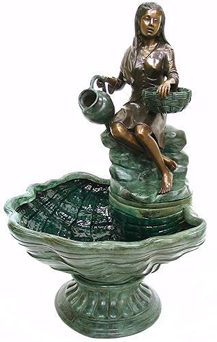 Woman Sitting on Fountain