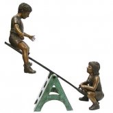 Bronze Children Playing on Seesaw Bronze Children Playing on Seesaw