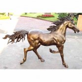 A Young Bronze Horse Trotting A Young Bronze Horse Trotting