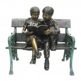 Bronze Kids sitting on a Bench Reading Bronze Kids sitting on a Bench Reading