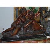 Bronze Kids sitting on Marble Base Bronze Kids sitting on Marble Base