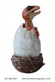Hatching Raptor Dinosaur in Egg Statue Hatching Raptor Dinosaur in Egg Statue