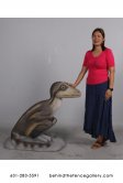 Juvenile Theropod Sitting Dinosaur Statue Juvenile Theropod Sitting Dinosaur Statue